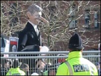 BBC News photo: giant statue of Blair is toppled